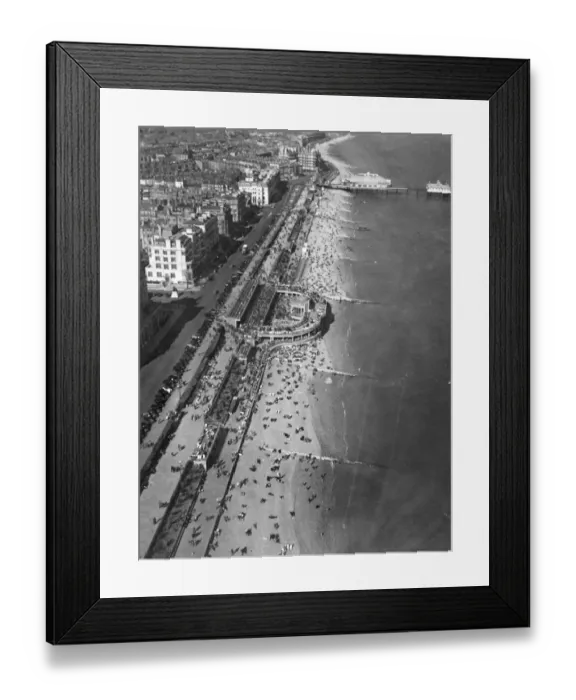 Framed Print : Eastbourne Beach, Sussex, photographed from the air while thousands of holidaymakers