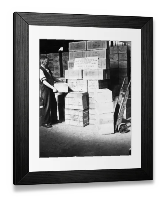Framed Print : 11 t of canned foods and soap, in the form of gift parcels from Australia, now stored