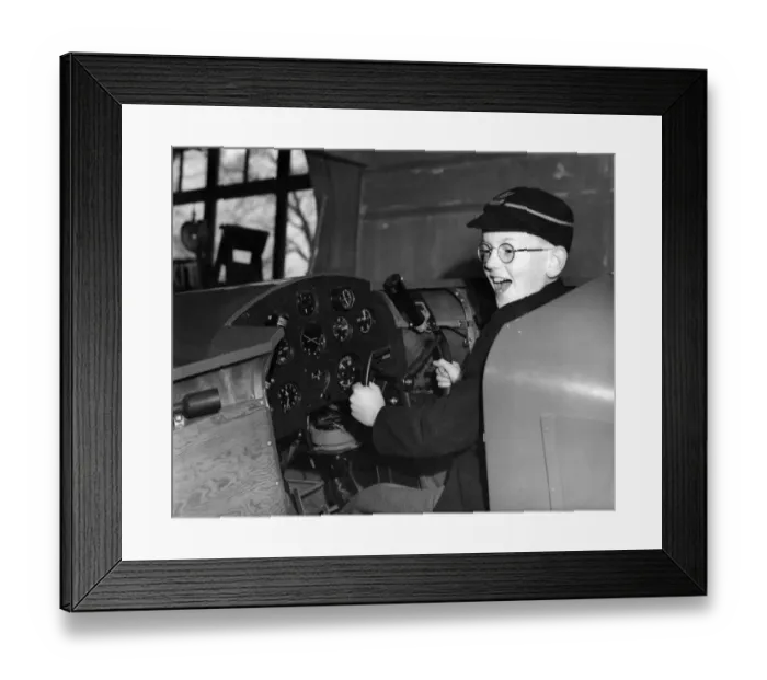 Framed Print : 13 year old David Roberts of Higham Road, Tottenham, London, tries out the controls Framed Print : 13 year old David Roberts of Higham Road, Tottenham, London, tries out the controls