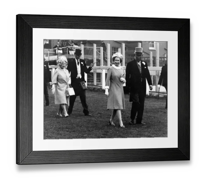 Framed Print : Queen Elizabeth II and her mother walk down the Epsom racecourse June 1971