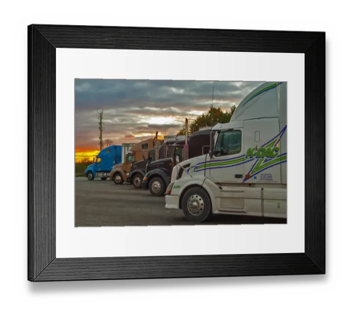 Framed Print : A great selection of trucks parked up at dusk on a Ontario service station SW of Framed Print : A great selection of trucks parked up at dusk on a Ontario service station SW of