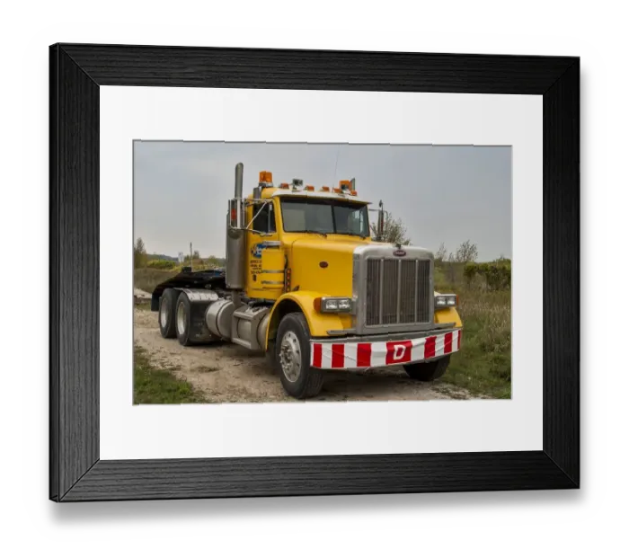 Framed Print : Yellow day cabbed 6x4 semi tracter unit, parked up at Owen Sound Ontario Framed Print : Yellow day cabbed 6x4 semi tracter unit, parked up at Owen Sound Ontario
