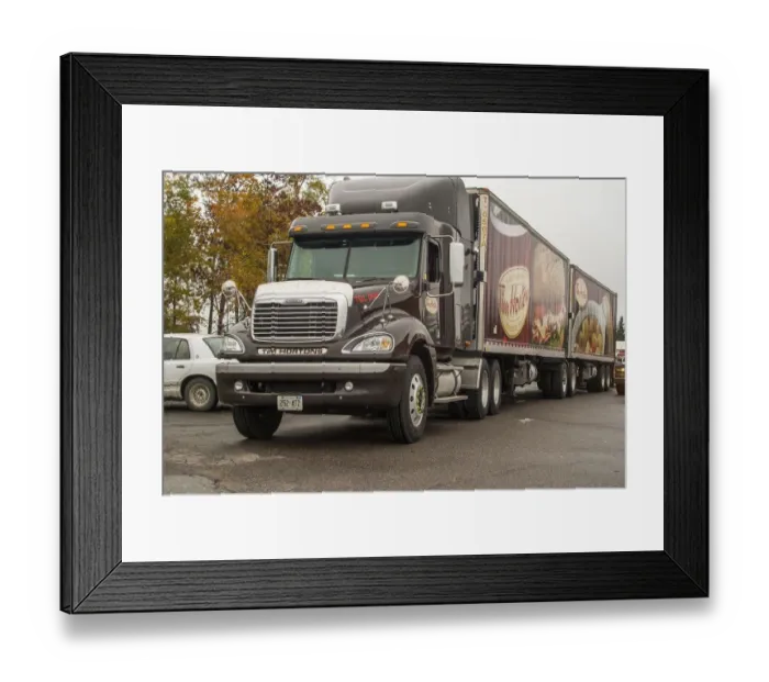 Framed Print : A freightliner 6x4 artic unit, hauling for the Canadian icon, Tim Hortons coffee