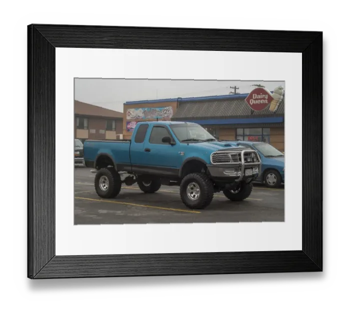 Framed Print : A customized Ford F150 with big wheels and tyres outside a Dairy Queen fast food