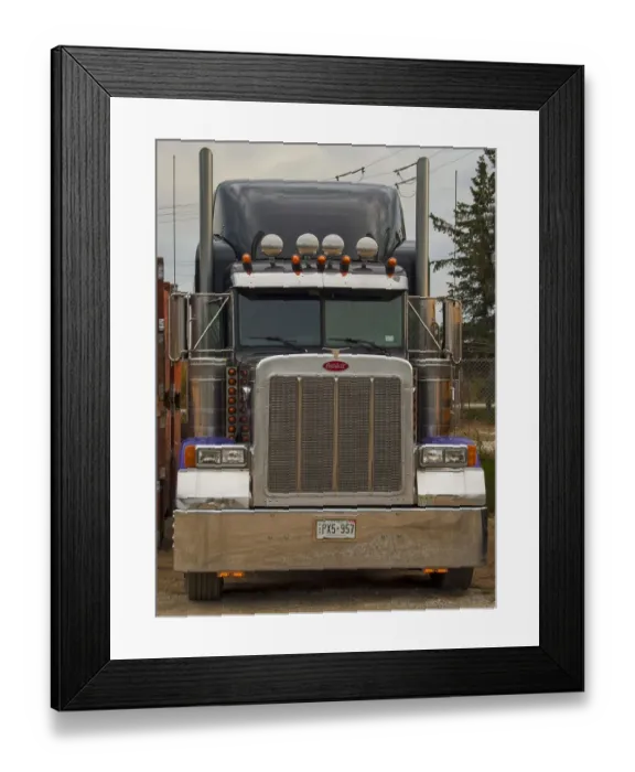 Framed Print : Peterbilt 6x4 semi tracter unit parked at its home depot Framed Print : Peterbilt 6x4 semi tracter unit parked at its home depot