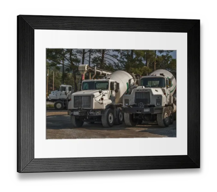 Framed Print : 3 x cement mixers parked up on waste ground on Manitoulin Island Ontario Canada Framed Print : 3 x cement mixers parked up on waste ground on Manitoulin Island Ontario Canada