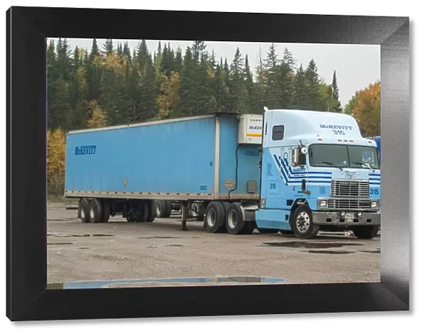 A 6x4 International tracker unit with a 2 axle box reefer (refrigerated trailer)