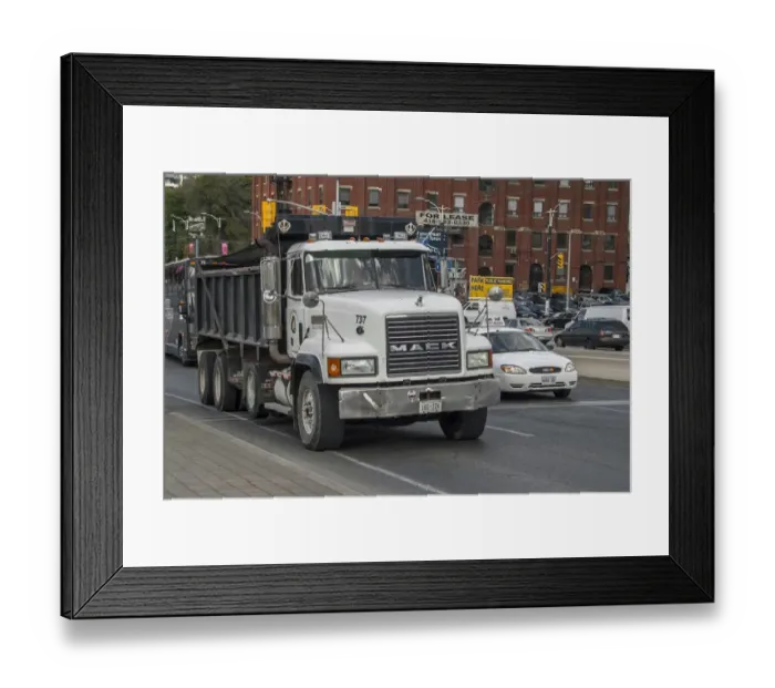 Framed Print : Mack 8 wheeled rigid tipper truck in down town Toronto traffic Framed Print : Mack 8 wheeled rigid tipper truck in down town Toronto traffic