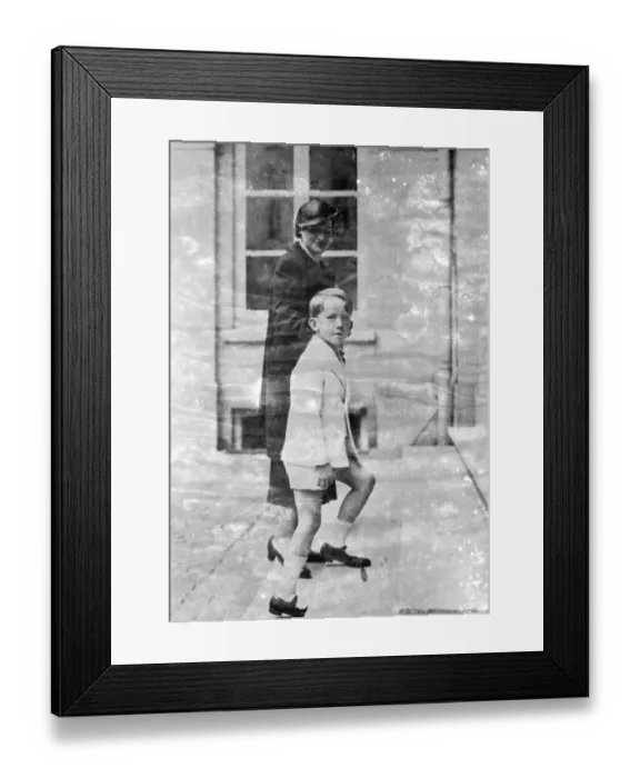 Framed Print : A Crown Prince comes home from school. Crown Prince Baudoin of Belgium clinging Framed Print : A Crown Prince comes home from school. Crown Prince Baudoin of Belgium clinging