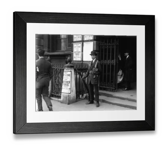 Framed Print : Royal Defence Force Sentry at Somerset House 1921 in front of posters offering good pay Framed Print : Royal Defence Force Sentry at Somerset House 1921 in front of posters offering good pay