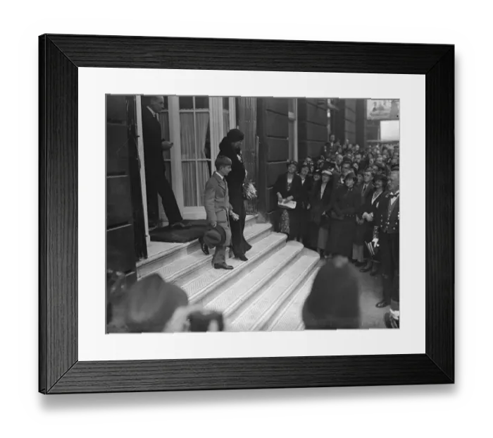 Framed Print : Peter, the new boy king of Yugoslavia, leaves the Ritz with his grandmother, Queen