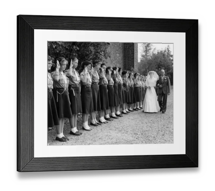 Framed Print : The 3rd Swanley Girl Guides form a Guard of Honour at St Marys Church as the bride Framed Print : The 3rd Swanley Girl Guides form a Guard of Honour at St Marys Church as the bride