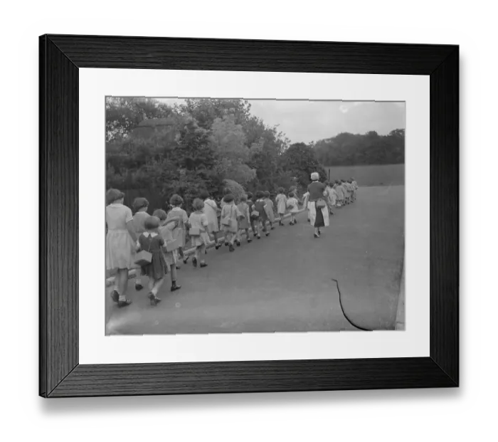 Framed Print : Children out with a nurse equipped with their gasmasks in Sidcup, Kent. 1939