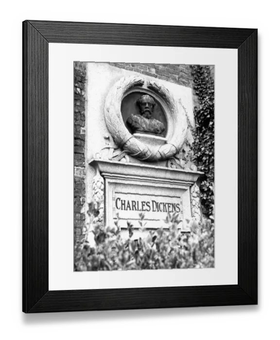Framed Print : A bust of Charles Dickens on the side of Bleak House which was once his home. Broadstairs