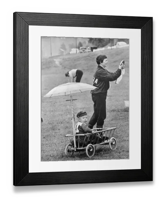 Framed Print : One year old Kent Nystrom is happy just sitting in the little truck watching mummy