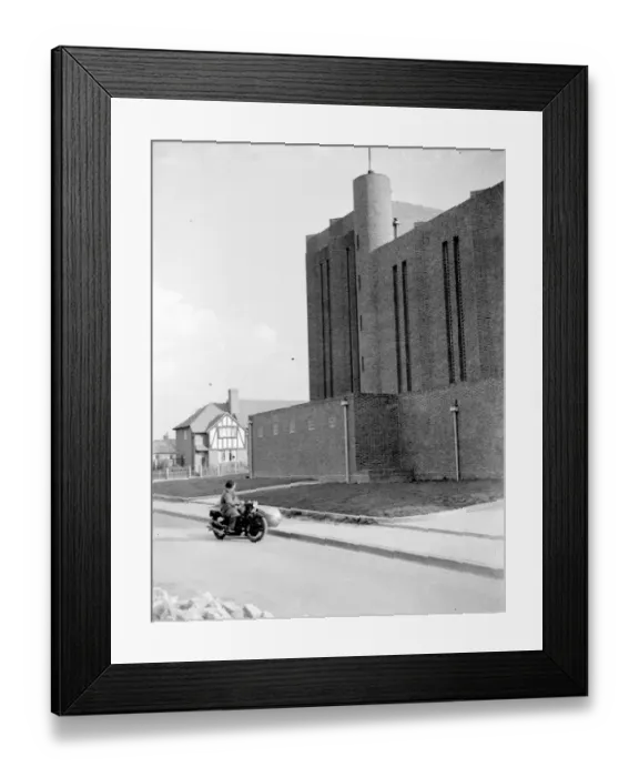 Framed Print : A motorcycle St Saviour Church, Eltham, Kent. 1934 Framed Print : A motorcycle St Saviour Church, Eltham, Kent. 1934