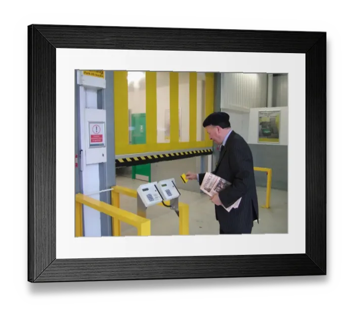Framed Print : Business man entering a building using a swipe card. ?TopFoto Framed Print : Business man entering a building using a swipe card. ?TopFoto