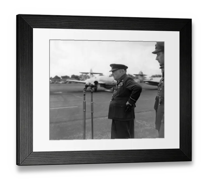 Framed Print : Winston Churchill in Air Commodores uniform stands hand on hip as he addresses 615