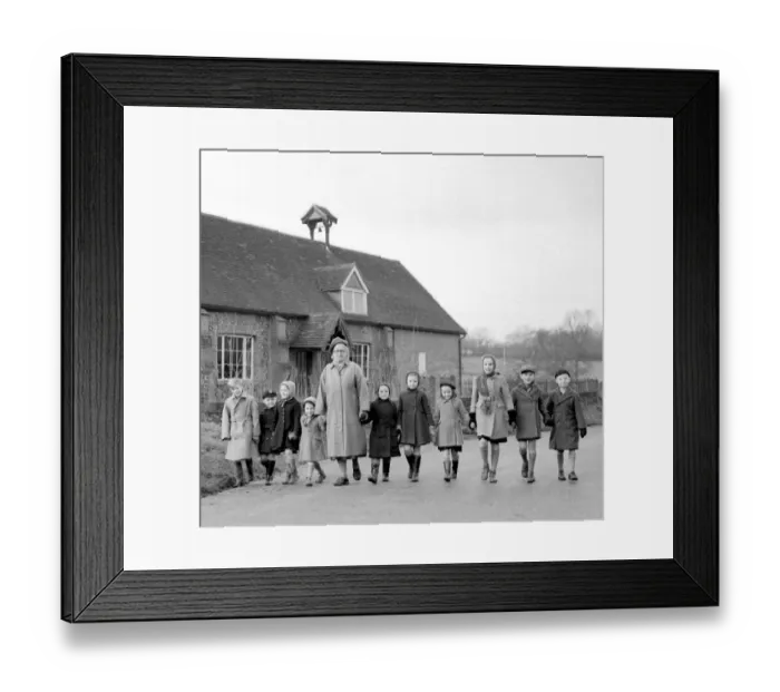 Framed Print : Leaving Stansted school in Kent. The smallest village school in the country. Mrs