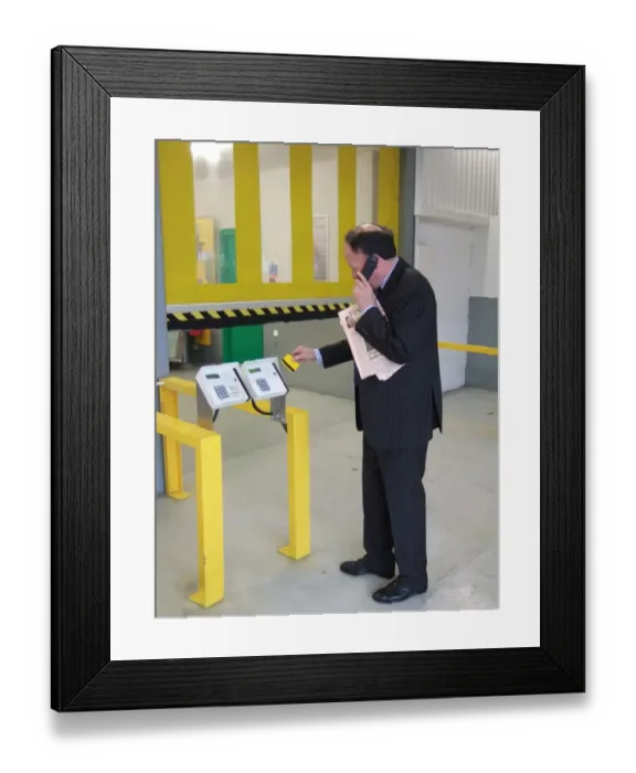 Framed Print : Business man entering a building using a swipe card. ?TopFoto Framed Print : Business man entering a building using a swipe card. ?TopFoto