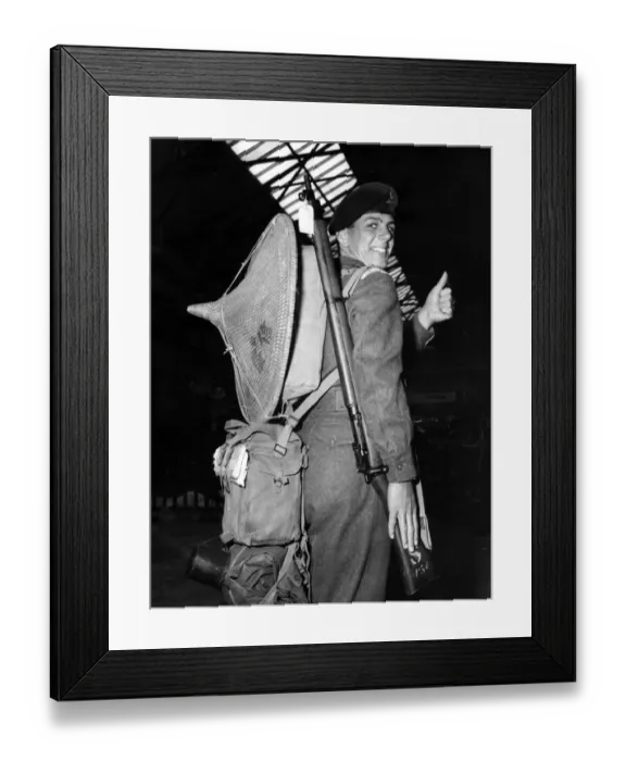 Framed Print : Not party of Army issue, but this gigantic coolie hat is the souvenir brought back Framed Print : Not party of Army issue, but this gigantic coolie hat is the souvenir brought back