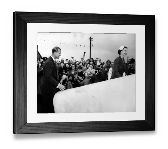 Framed Print : The Queen and the Duke of Edinburgh smile in response to the delighted crowd cheering Framed Print : The Queen and the Duke of Edinburgh smile in response to the delighted crowd cheering