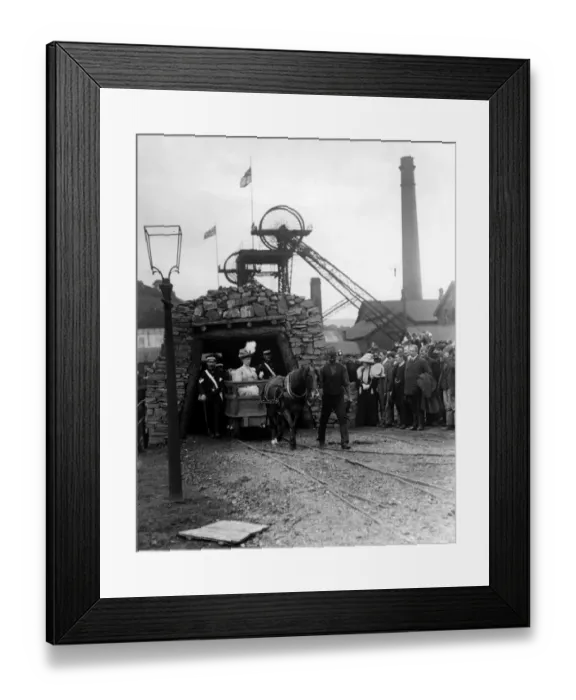 Framed Print : Queen Mary is led out of a coal mine by a miner and pit pony during a Royal visit Framed Print : Queen Mary is led out of a coal mine by a miner and pit pony during a Royal visit