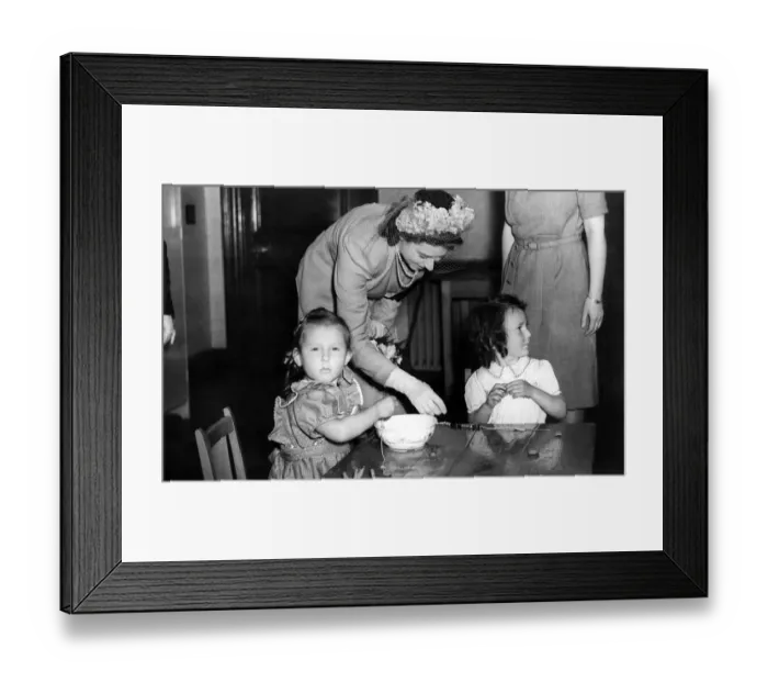 Framed Print : Princess Elizabeth chatting to two of the tiny tots during her visit to Edzell Lodge