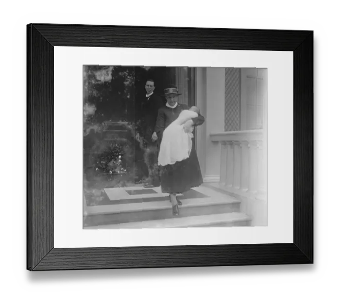 Framed Print : The baby Prince leaving 3 Belgrave Square in the arms of his nurse for Buckingham Palace Framed Print : The baby Prince leaving 3 Belgrave Square in the arms of his nurse for Buckingham Palace