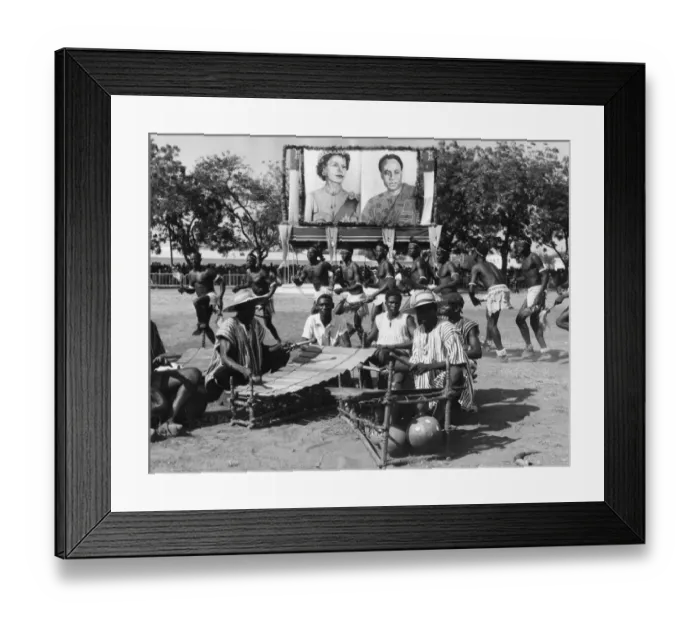 Framed Print : Dancers leap and jump round the men playing the native idea of a xylophone, at the durbar at Tamale Framed Print : Dancers leap and jump round the men playing the native idea of a xylophone, at the durbar at Tamale