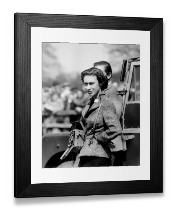 Framed Print : With Camera Ready, the Princess Watched Badminton, Gloucester : Wearing a flower Framed Print : With Camera Ready, the Princess Watched Badminton, Gloucester : Wearing a flower