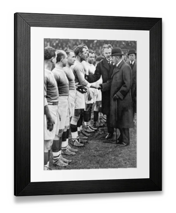 Framed Print : Royal interest in International Rugger The King shaking hands with the French team