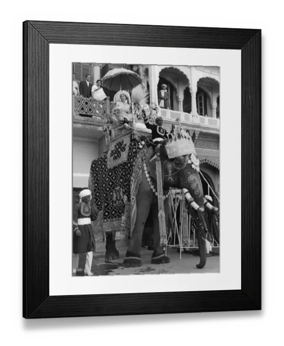 Framed Print : H. M. Queen Elizabeth II smiles from atop a ten-feet high elephant at Ramnagar Fort Framed Print : H. M. Queen Elizabeth II smiles from atop a ten-feet high elephant at Ramnagar Fort