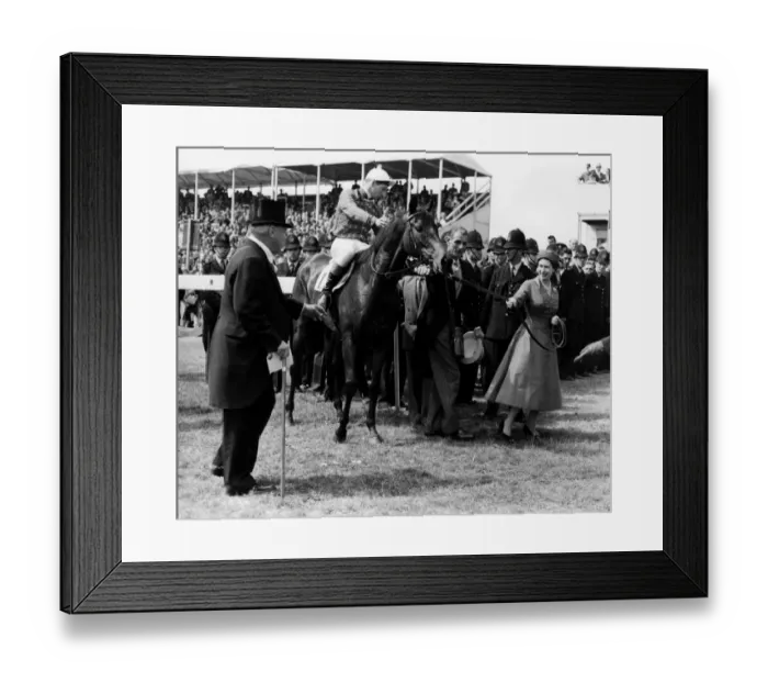 Framed Print : HM Queen Elizabeth II leads her horse Carrozza in after it has won the 179th Oaks Stakes Framed Print : HM Queen Elizabeth II leads her horse Carrozza in after it has won the 179th Oaks Stakes