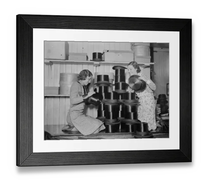Framed Print : The rush to buy silk hats for the Royal Wedding keeps London factories busy. 5
