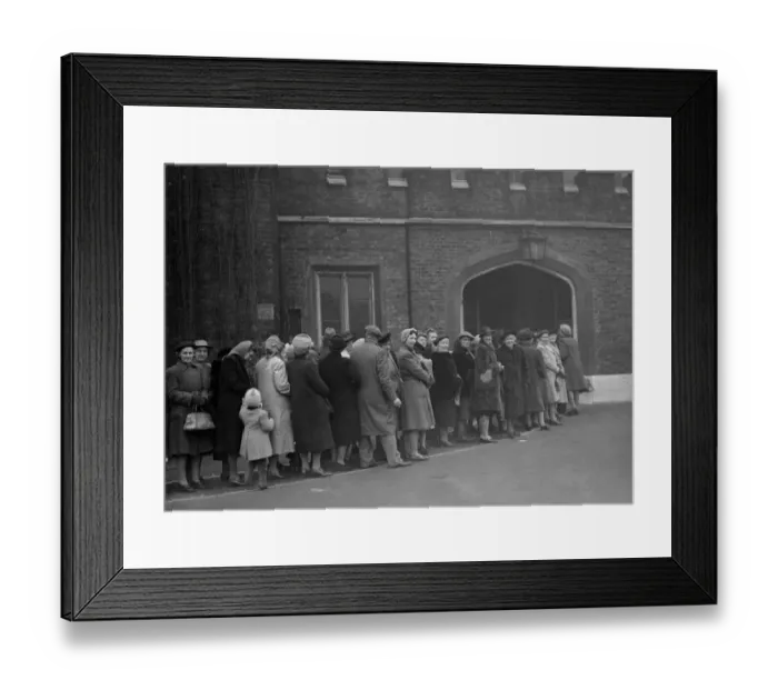 Framed Print : Royal wedding. Composed mainly of women, the eager queue waits patiently outside Framed Print : Royal wedding. Composed mainly of women, the eager queue waits patiently outside