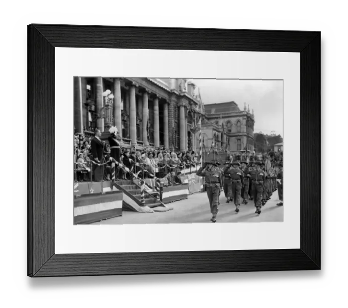 Framed Print : The Governor General takes the salute as New Zealand servicemen march by Parliament