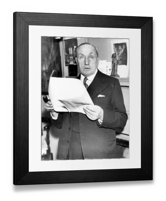 Framed Print : Walter John Tapper, architect, shown working in his London Office, has been elected