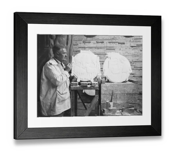 Framed Print : Mr James Woodford at work in his London studio on the plaster casts of the plaques