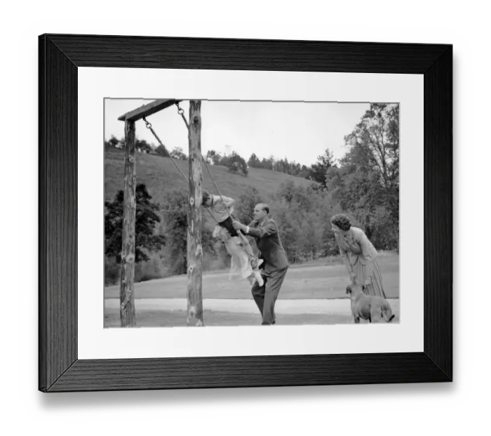 Framed Print : Duke of Edinburgh provides the push for Prince Charles and Princess Anne as they Framed Print : Duke of Edinburgh provides the push for Prince Charles and Princess Anne as they