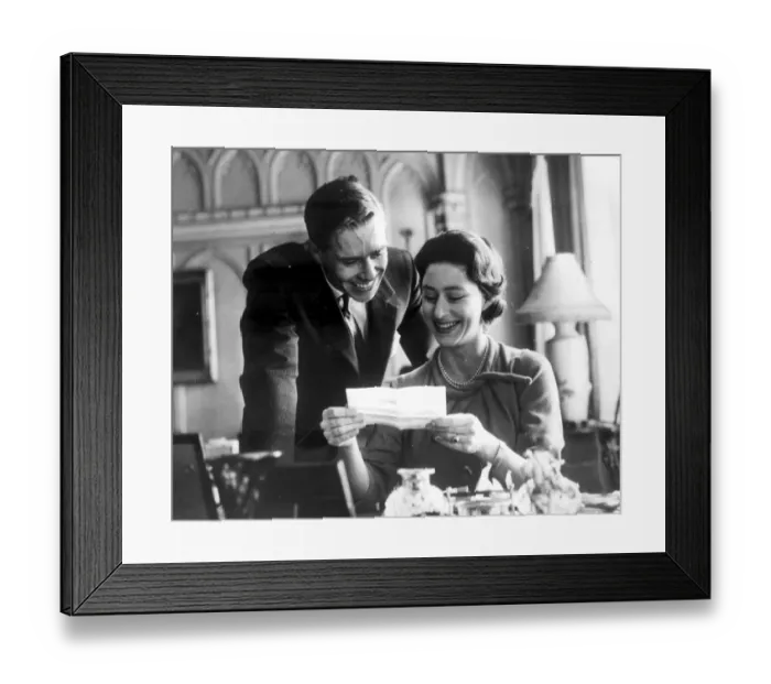 Framed Print : Engagement picture of Princess Margaret and Anthony Armstrong Jones reading a telegram Framed Print : Engagement picture of Princess Margaret and Anthony Armstrong Jones reading a telegram