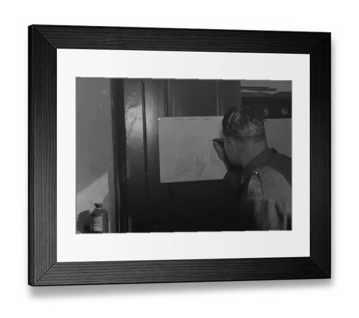 Framed Print : A Royal Engineer soldier drawing survey maps from notes and memory. 1937 Framed Print : A Royal Engineer soldier drawing survey maps from notes and memory. 1937
