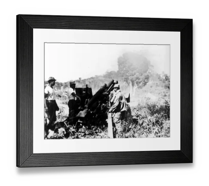 Framed Print : Laos: Royal laotian artillerymen fire a 105mm. Howitzer against a rebel position Framed Print : Laos: Royal laotian artillerymen fire a 105mm. Howitzer against a rebel position
