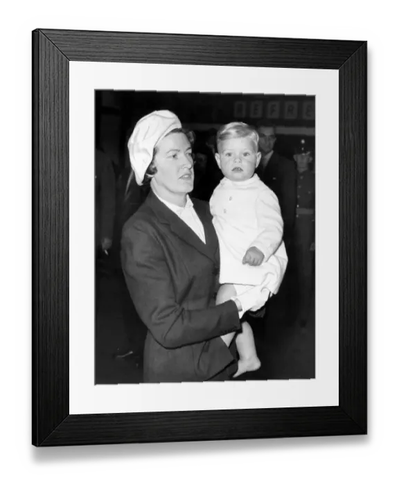 Framed Print : Eighteen-month-old Prince Andrew, in the arms of his nurse Miss Mabel Anderson when