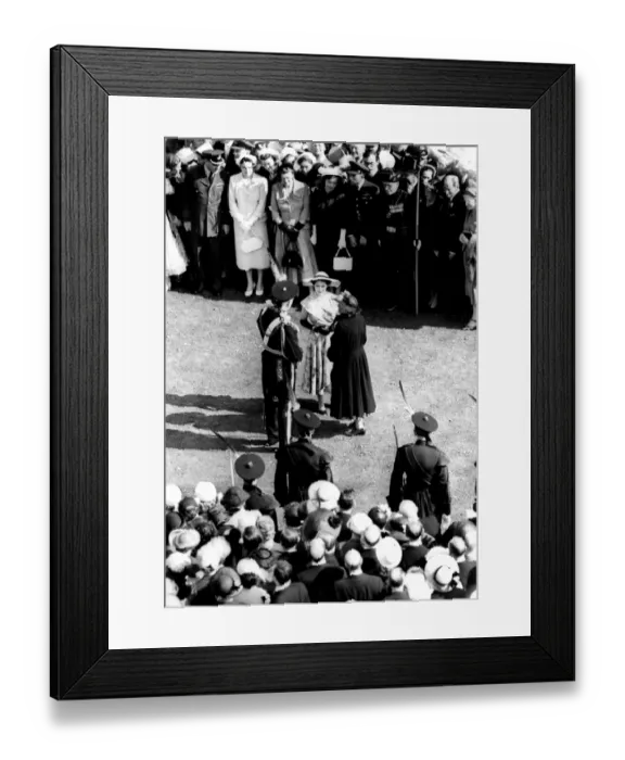 Framed Print : HM The Queen wore a patterned blue silk dress, and wide-brimmed blue hat, as she Framed Print : HM The Queen wore a patterned blue silk dress, and wide-brimmed blue hat, as she