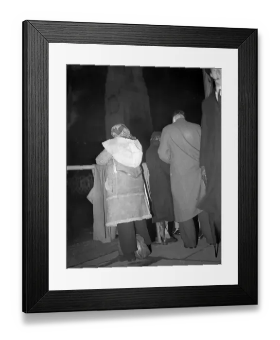 Framed Print : Royal Wedding. A women wrapped up with a fur coat and cape takes up her spot in Whitehall Framed Print : Royal Wedding. A women wrapped up with a fur coat and cape takes up her spot in Whitehall