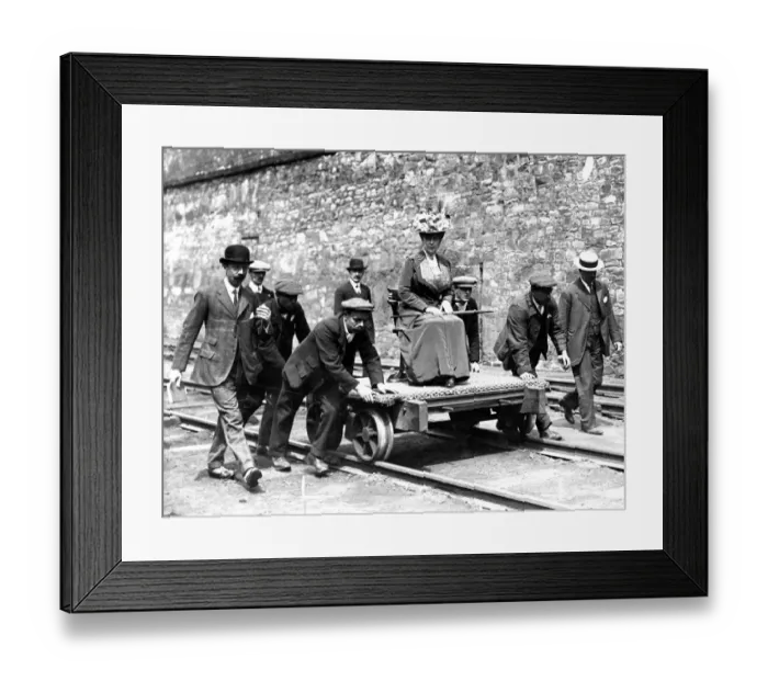 Framed Print : Queen Mary pictured being pushed on a coal trolley after a tour of the coal mine