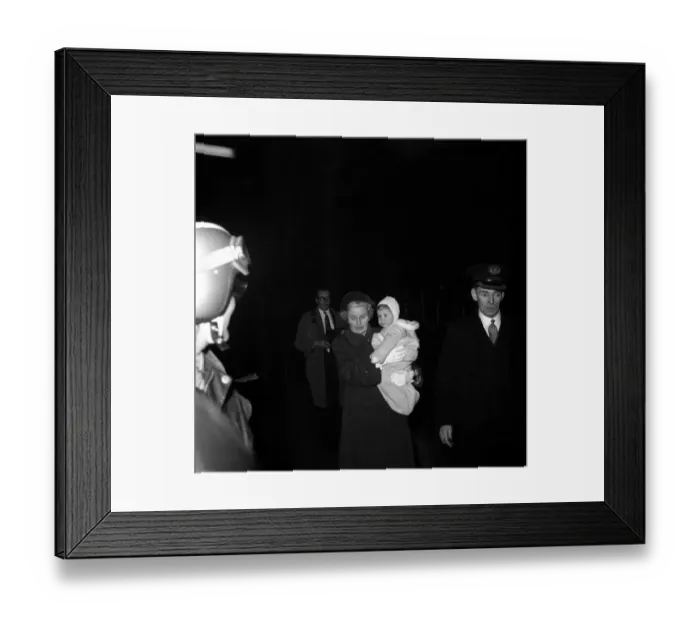 Framed Print : First train trip since Christmas In the arms of his nurse Viscount Linley son Framed Print : First train trip since Christmas In the arms of his nurse Viscount Linley son