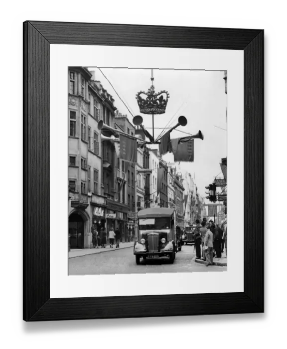 Framed Print : Coronation decorations go up and this shows something of the motie in Old Bond Street Framed Print : Coronation decorations go up and this shows something of the motie in Old Bond Street