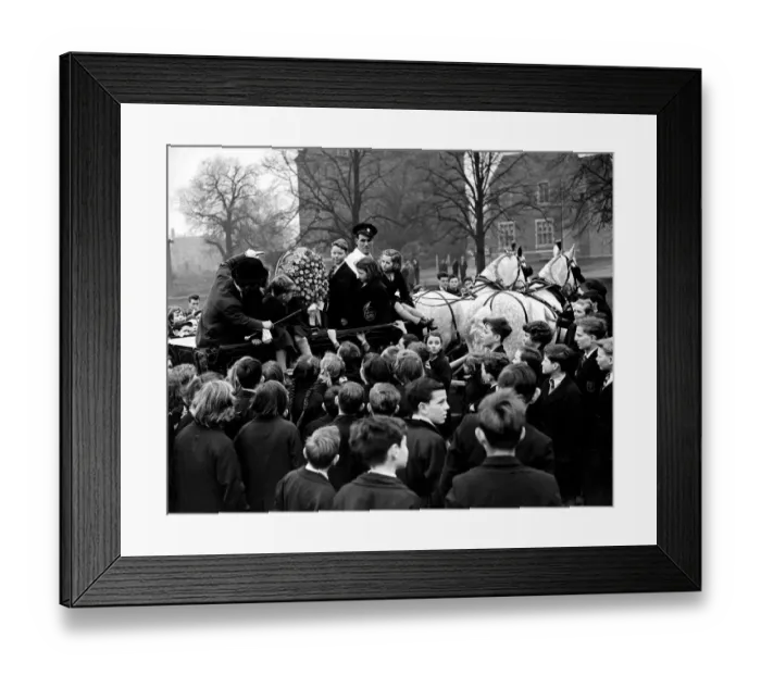 Framed Print : The giant Easter Egg filled with lots and lots of cream toffees is loaded onto